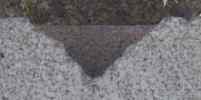 concrete block notch with
	green beret